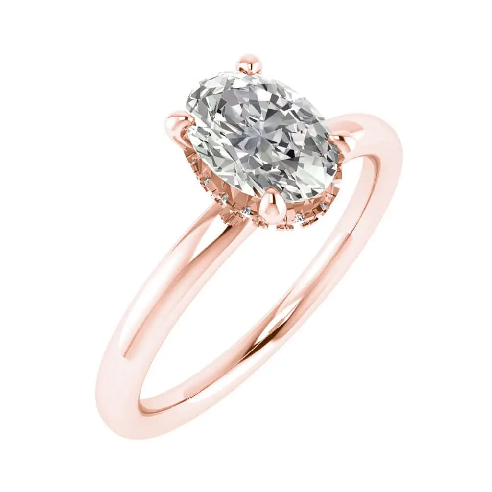 frontal image of oval rose gold hidden halo lab diamond engagement ring