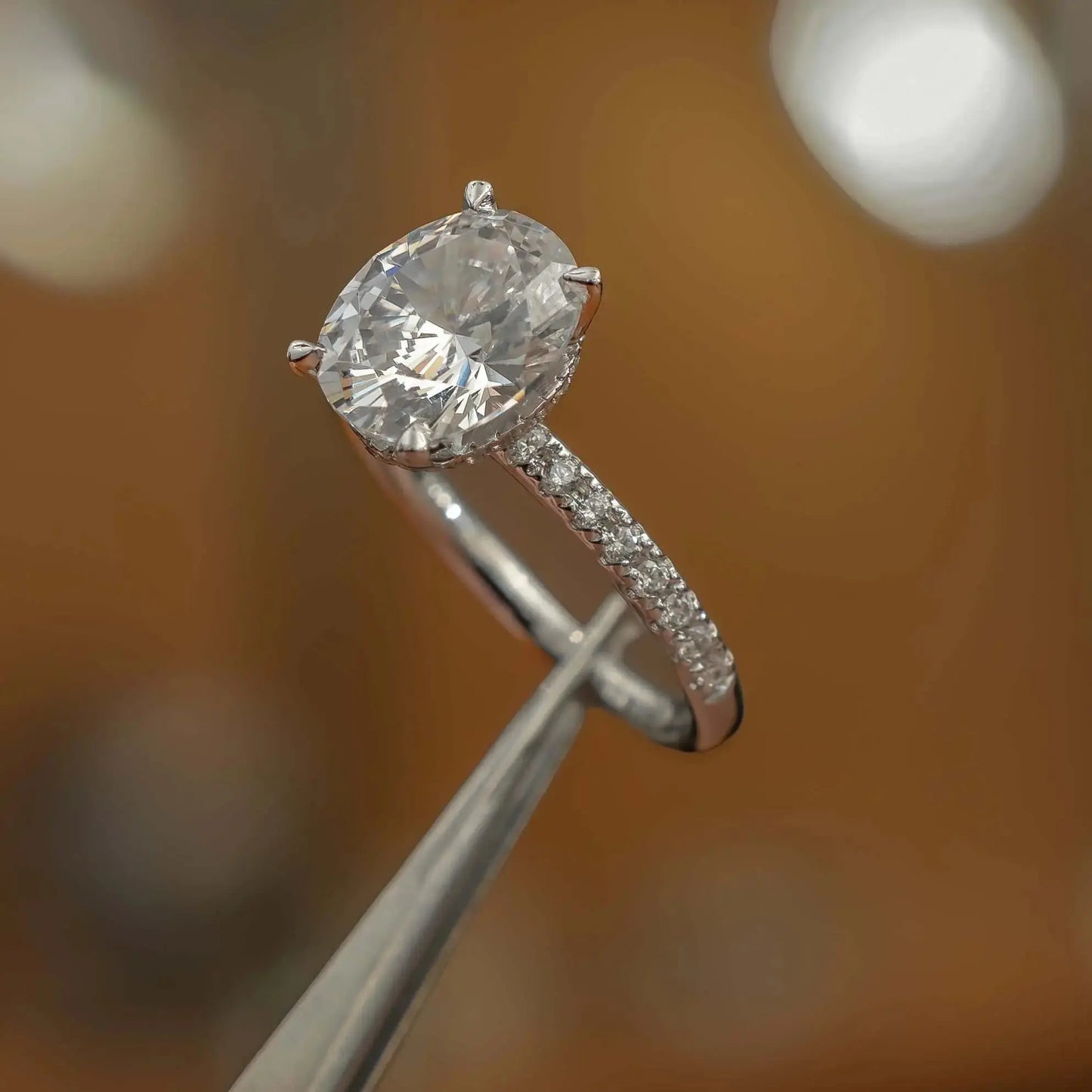 image of luxury oval platinum diamond set shoulders hidden halo lab grown diamond engagement ring
