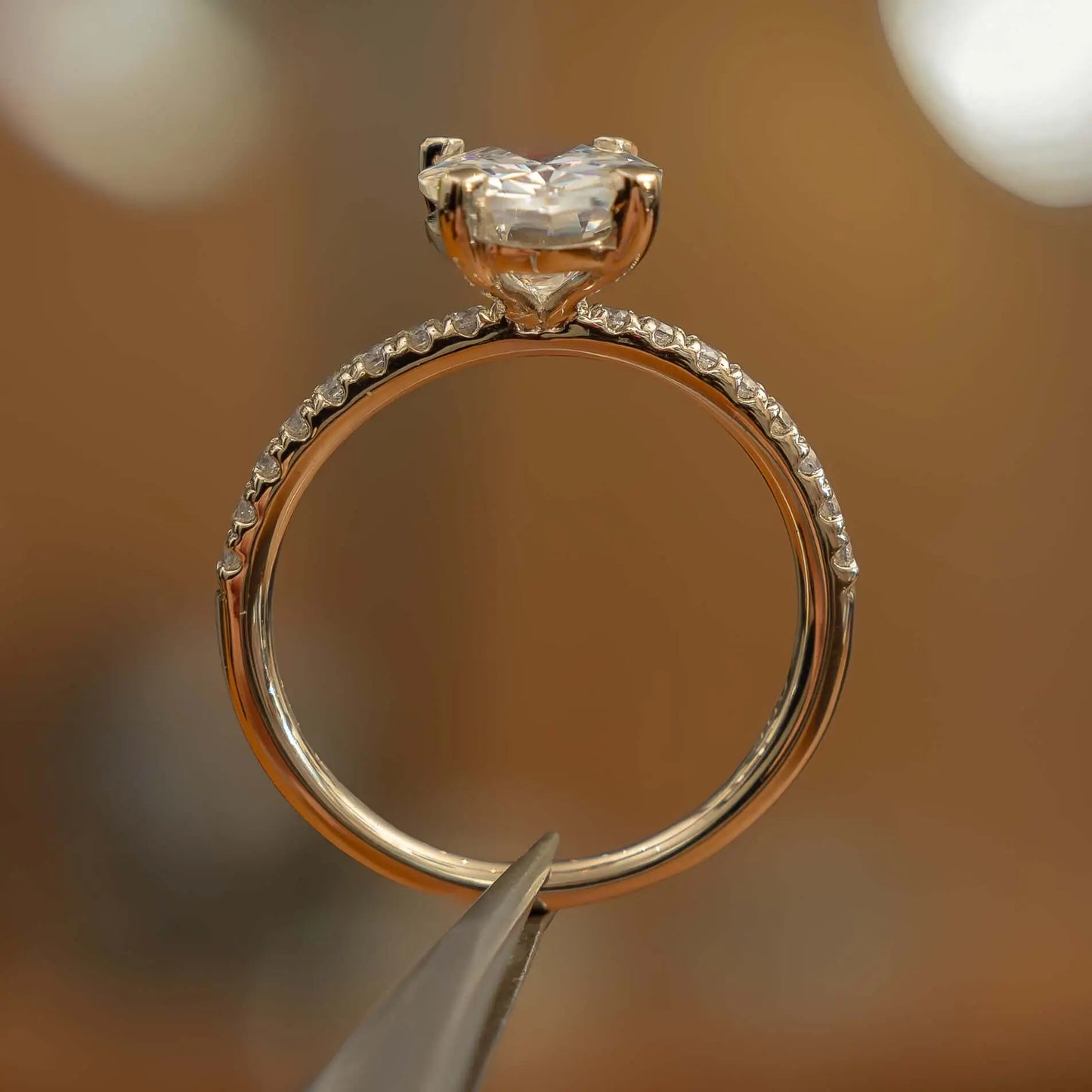 side image oval yellow gold diamond set shoulders lab grown diamond engagement ring