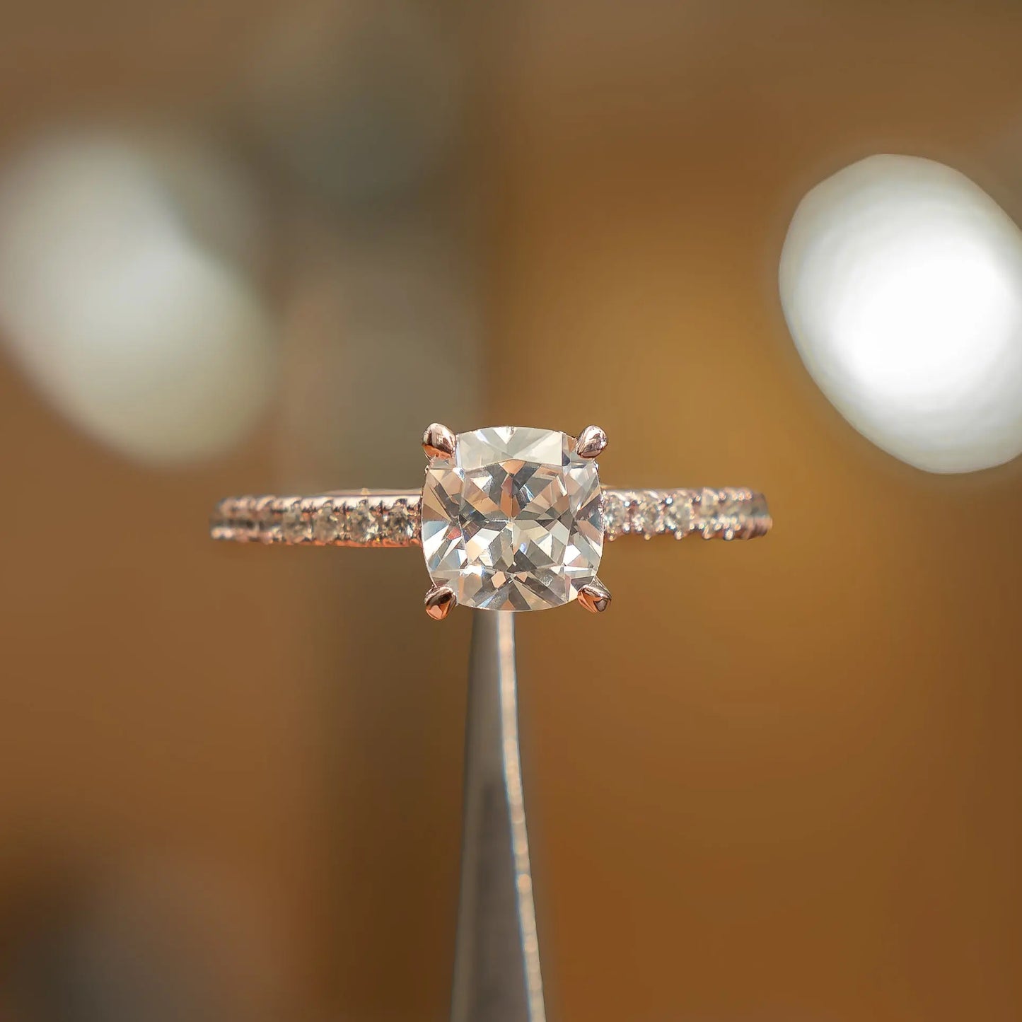 front on image luxury cushion rose gold diamond set shoulders hidden halo lab grown diamond engagement ring