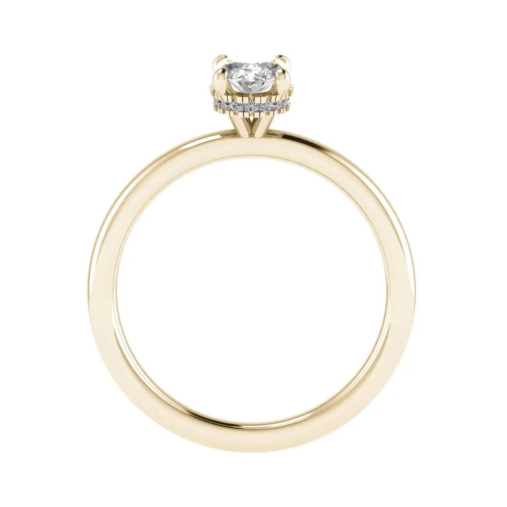 side image of luxury oval yellow gold hidden halo lab grown diamond engagement ring