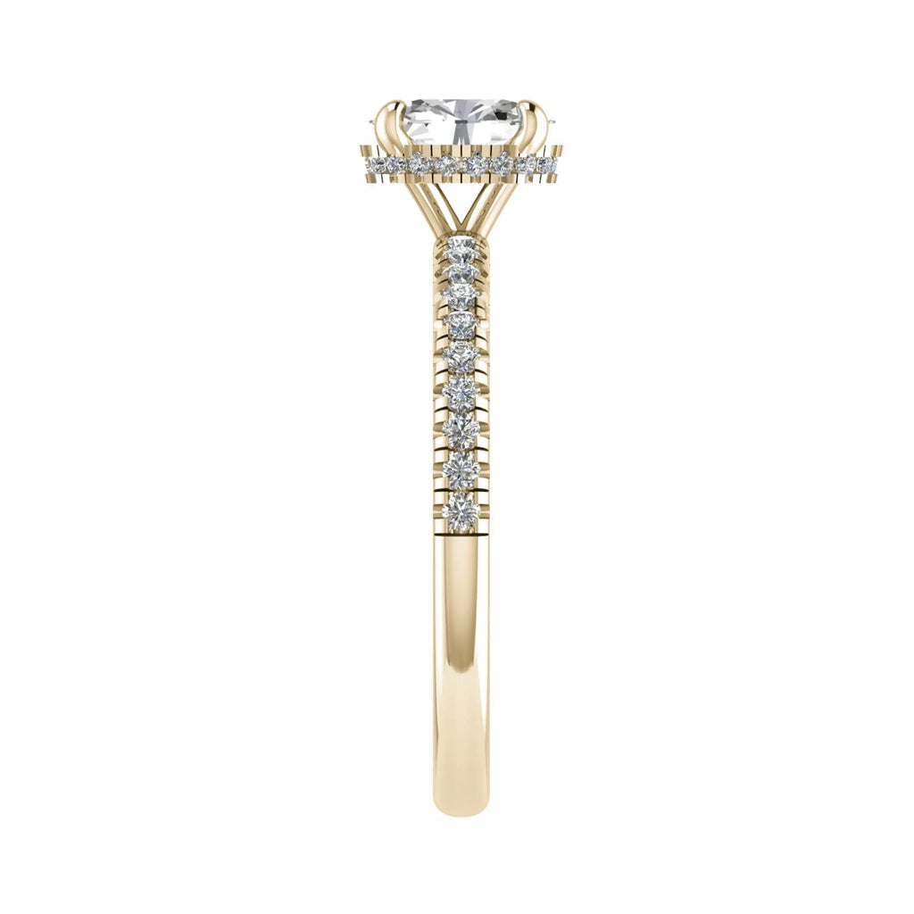 side angle luxury oval yellow gold diamond set shoulders hidden halo lab grown diamond engagement ring