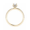 side image in studio of luxury oval yellow gold diamond set shoulders hidden halo lab grown diamond engagement ring