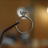 image of luxury cushion platinum hidden halo solitaire lab grown diamond engagement ring