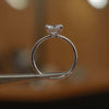 side image in studio luxury princess white gold diamond set shoulders lab grown diamond engagement ring