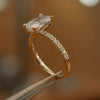 right side view oval yellow gold diamond set shoulders lab grown diamond engagement ring