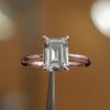 frontal view of luxury emerald rose gold solitaire lab grown diamond engagement ring