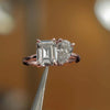 luxury emerald and pear rose gold lab grown diamond pair engagement ring in studio