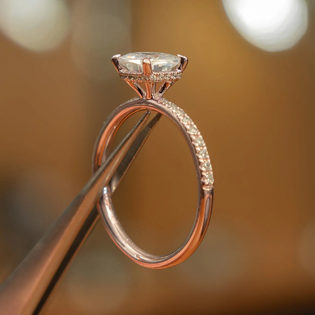 side view luxury cushion rose gold diamond set shoulders hidden halo lab grown diamond engagement ring image