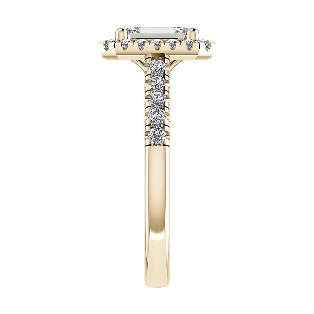 side angle luxury emerald yellow gold diamond halo lab grown diamond engagement ring