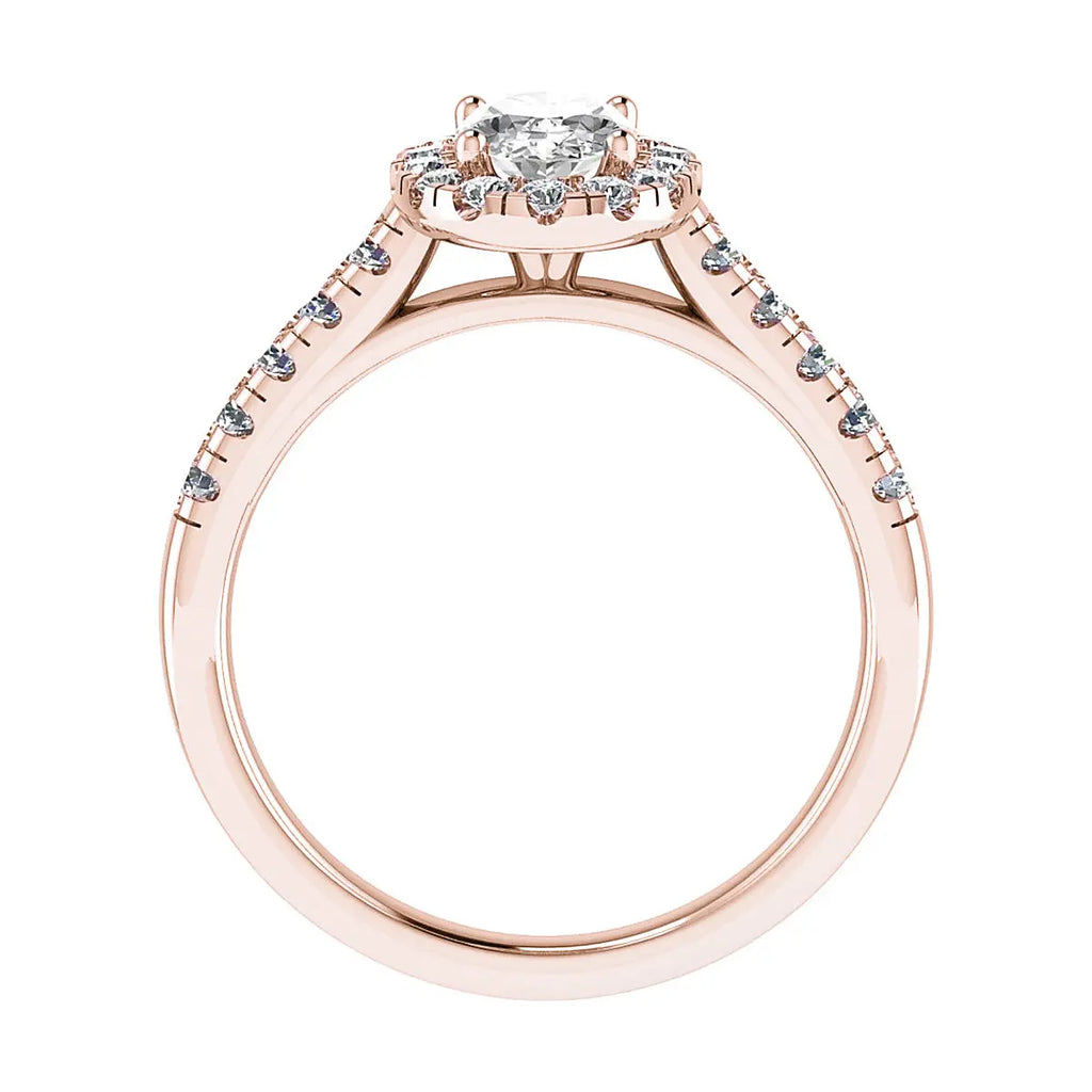 studio shot of luxury rose gold diamond set shoulders halo lab grown diamond engagement ring