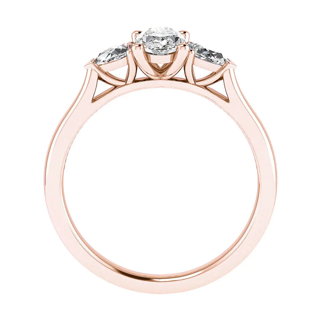 side view luxury rose gold diamond trilogy round lab grown diamond engagement ring