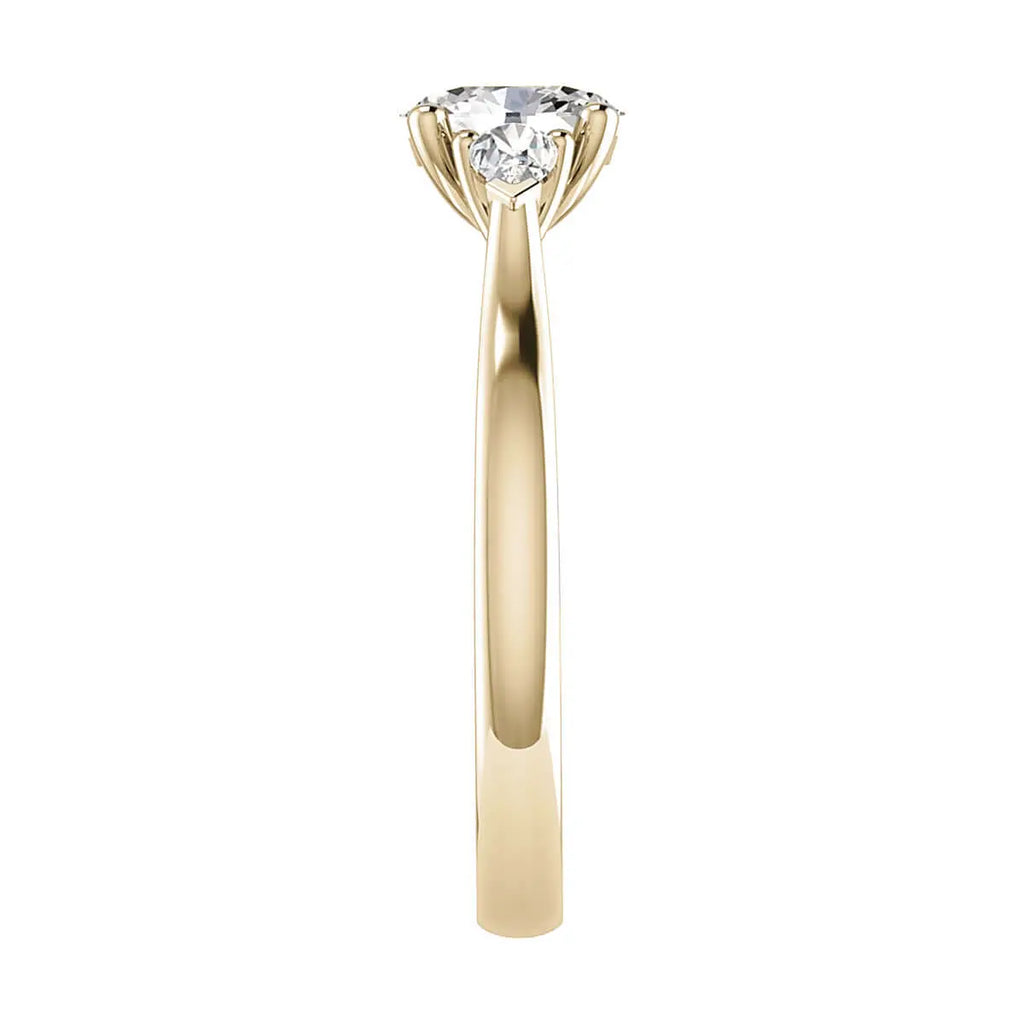 side angle luxury oval white gold trilogy lab grown diamond engagement ring