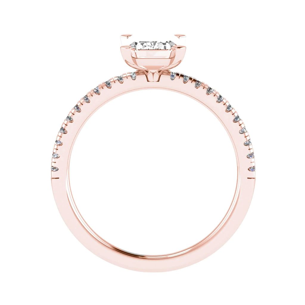 side view of luxury emerald rose gold diamond set shoulders lab grown diamond engagement ring