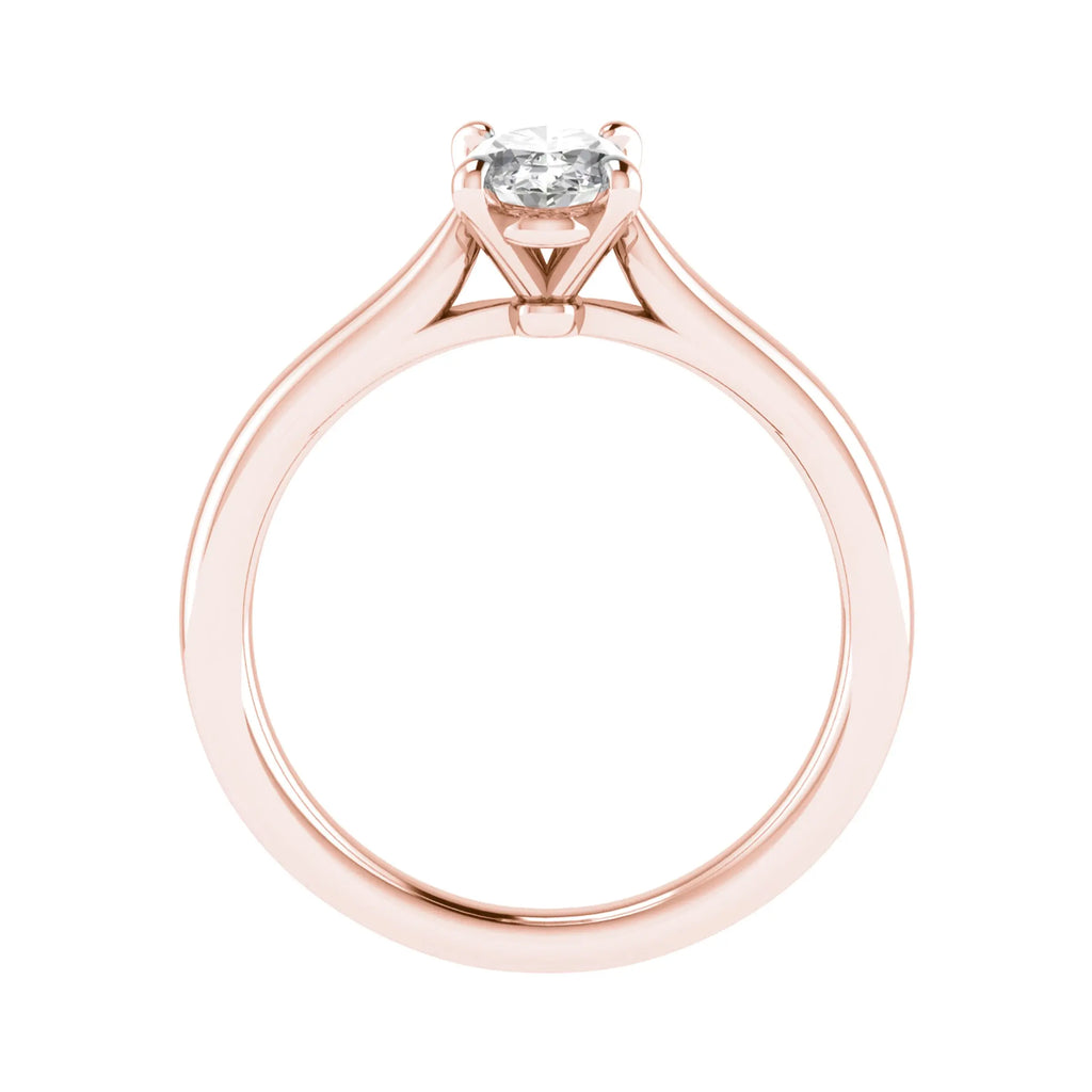 side view luxury oval rose gold solitaire lab grown diamond engagement ring in studio