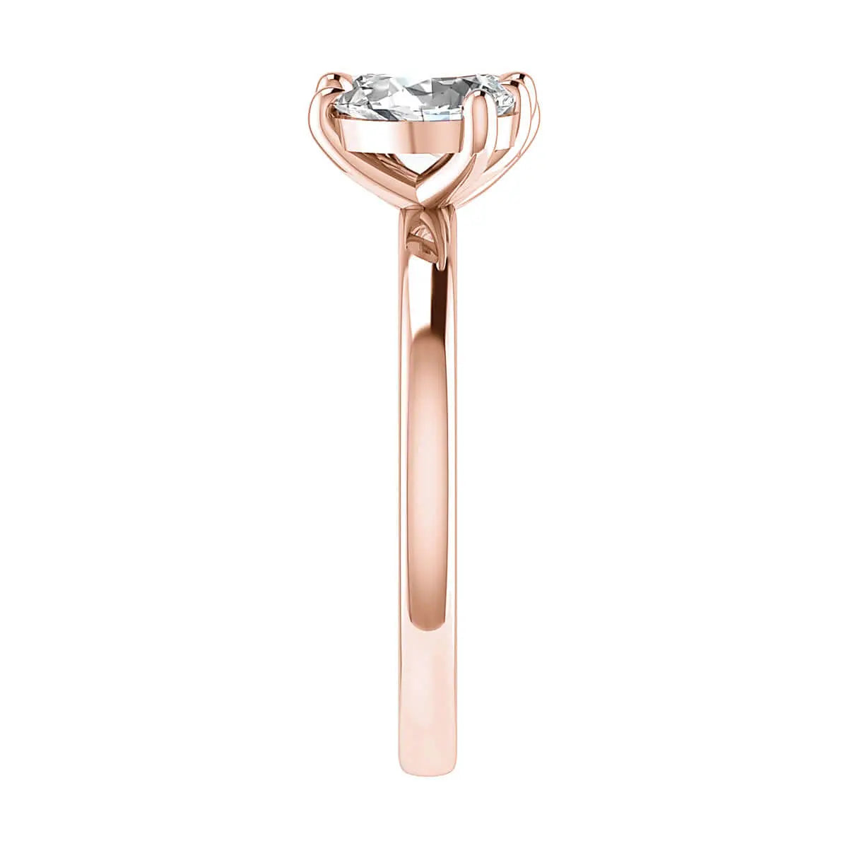side angle luxury emerald and pear rose gold lab grown diamond pair engagement ring