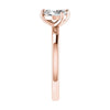 side angle luxury emerald and pear rose gold lab grown diamond pair engagement ring