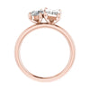 side view luxury emerald and pear rose gold lab grown diamond pair engagement ring