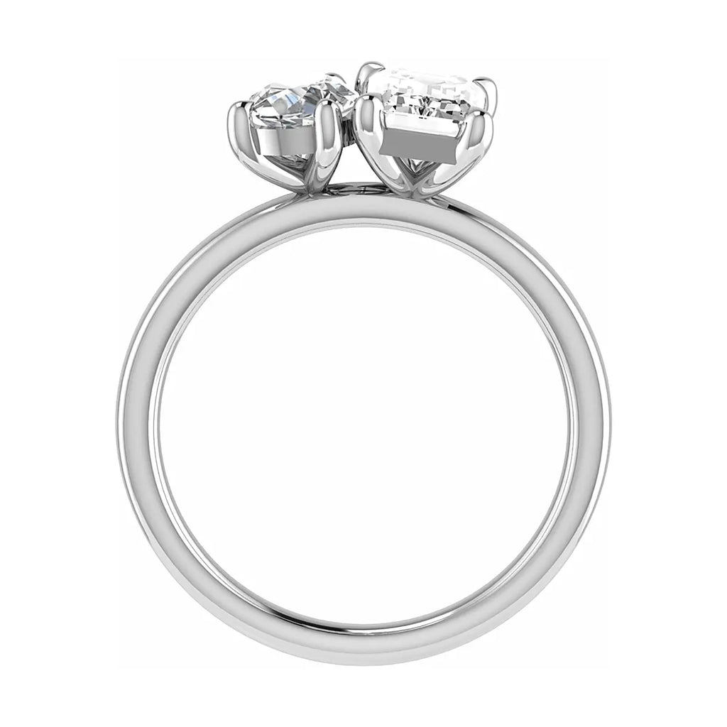 side view luxury emerald and pear white gold lab grown diamond pair engagement ring