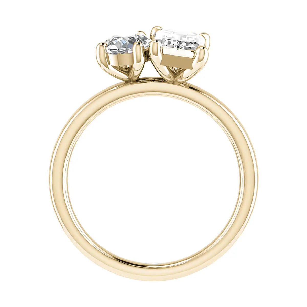 side view luxury emerald and pear yellow gold lab grown diamond pair engagement ring