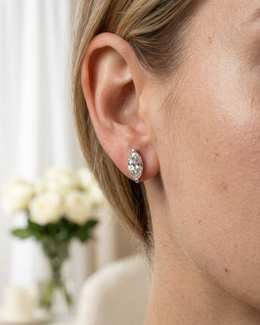 Marquise-cut diamond stud earrings — Luxury Bridal Jewelry Close-up | Generated by Modelize