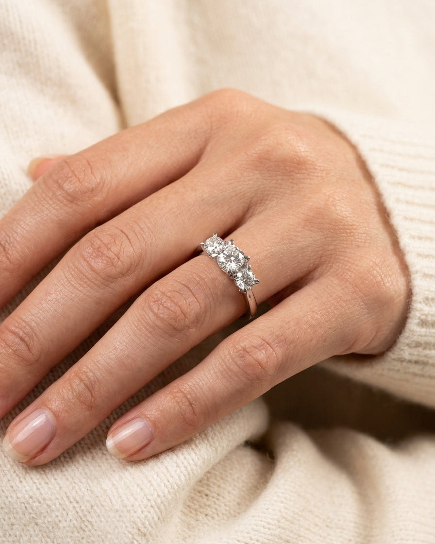 Three-stone engagement ring — Luxury Bridal Jewelry Close-up | Generated by Modelize