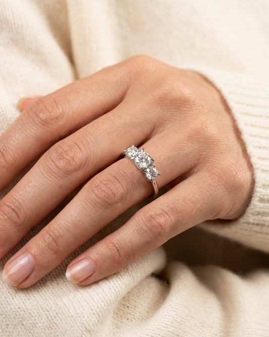 Three-stone engagement ring — Luxury Bridal Jewelry Close-up | Generated by Modelize